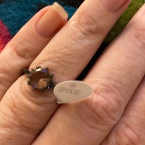 Peachy pink black gun metal ring